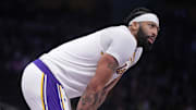 Dec 15, 2024; Los Angeles, California, USA; Los Angeles Lakers forward Anthony Davis (3) reacts in the first half against the Memphis Grizzlies at Crypto.com Arena. Mandatory Credit: Kirby Lee-Imagn Images