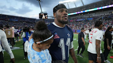 Feb 2, 2025; Orlando, FL, USA; NFC defensive end Micah Parson of the Dallas Cowboys (11) holds his daughter Shatara Parsons after the 2025 Pro Bowl Games at Camping World Stadium. Mandatory Credit: Kirby Lee-Imagn Images
