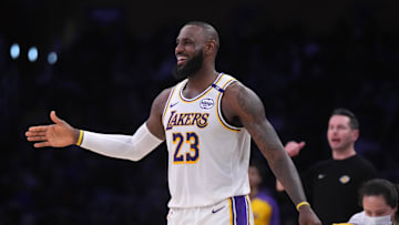 Dec 15, 2024; Los Angeles, California, USA; Los Angeles Lakers forward LeBron James (23) reacts in the first half against the Memphis Grizzlies at Crypto.com Arena. Mandatory Credit: Kirby Lee-Imagn Images