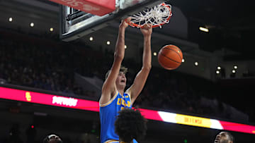 UCLA Bruins center Aday Mara dunks the ball against the Southern California Trojans in the first half at Galen Center. Mandatory Credit: Kirby Lee-Imagn Images