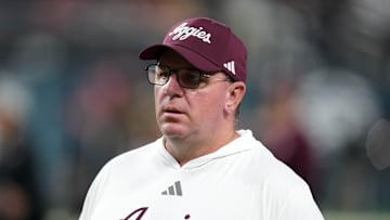 Dec 27, 2024; Las Vegas, NV, USA; Texas A&M Aggies head coach Mike Elko reacts against the Southern California Trojans in the first half at Allegiant Stadium. Mandatory Credit: Kirby Lee-Imagn Images