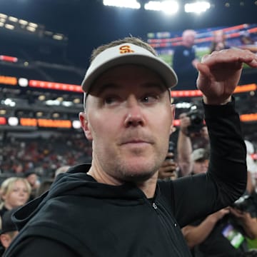 Dec 27, 2024; Las Vegas, NV, USA; Southern California Trojans head coach Lincoln Riley reacts after the game against the Texas A&M Aggies at Allegiant Stadium. Mandatory Credit: Kirby Lee-Imagn Images