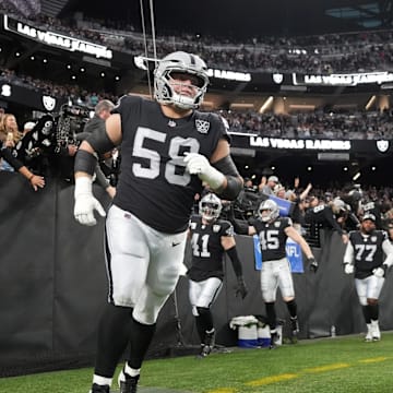 Dec 22, 2024; Paradise, Nevada, USA; Las Vegas Raiders guard Jackson Powers-Johnson (58) enters the field before the game against the Jacksonville Jaguars at Allegiant Stadium. Mandatory Credit: Kirby Lee-Imagn Images