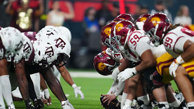 Dec 27, 2024; Las Vegas, NV, USA; Helmets at the line fo scrimmage as DUPLICATE***Southern California Trojans long snapper Ha