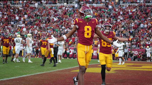 Nov 30, 2024; Los Angeles, California, USA; Southern California Trojans wide receiver Ja'Kobi Lane (8) celebrates after scori