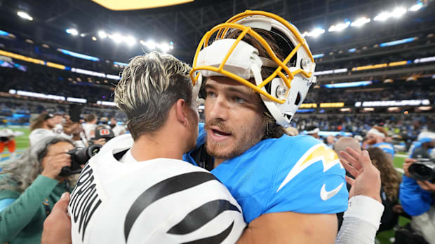 Nov 17, 2024; Inglewood, California, USA; iCincinnati Bengals quarterback Joe Burrow (9) and Los Angeles Chargers quarterback