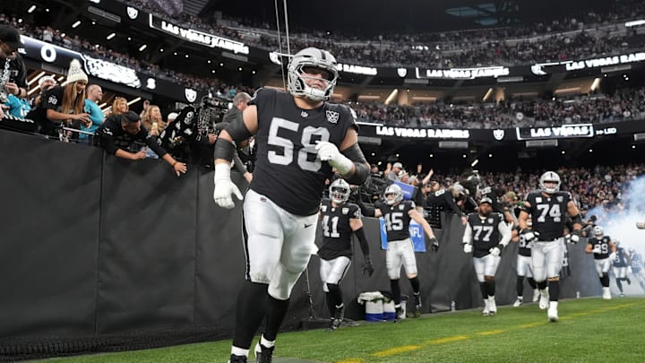 Dec 22, 2024; Paradise, Nevada, USA; Las Vegas Raiders guard Jackson Powers-Johnson (58) enters the field before the game against the Jacksonville Jaguars at Allegiant Stadium. Mandatory Credit: Kirby Lee-Imagn Images
