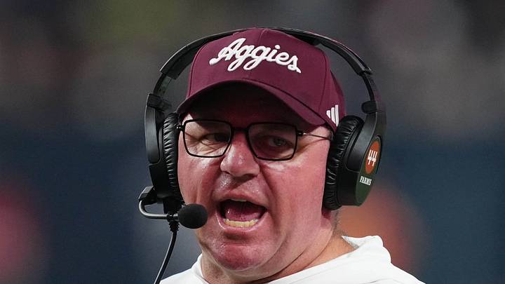 Dec 27, 2024; Las Vegas, NV, USA; Texas A&M Aggies head coach Mike Elko reacts against the Southern California Trojans in the second half at Allegiant Stadium. Mandatory Credit: Kirby Lee-Imagn Images