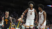 Jan 14, 2025; Los Angeles, California, USA; Southern California Trojans forward Saint Thomas (0) and guard Wesley Yates III (6) and Iowa Hawkeyes guard Brock Harding (2) react in the second half at the Galen Center. Mandatory Credit: Kirby Lee-Imagn Images