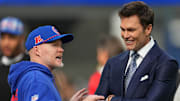 Dec 8, 2024; Inglewood, California, USA; Buffalo Bills coach Sean McDermott talks with Tom Brady during the game against the Los Angeles Rams at SoFi Stadium. Mandatory Credit: Kirby Lee-Imagn Images