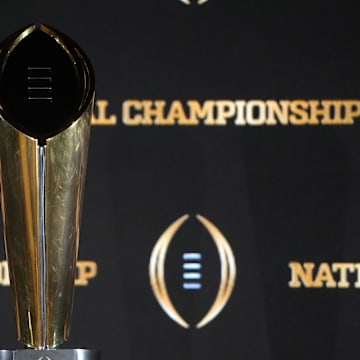 Jan 19, 2025; Atlanta, GA, USA; The College Football Playoff National Championship trophy at a press conference at The Westin Peachtree Plaza, Savannah Ballroom. Mandatory Credit: Kirby Lee-Imagn Images