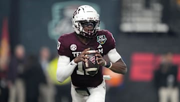 Dec 27, 2024; Las Vegas, NV, USA; Texas A&M Aggies quarterback Marcel Reed (10) throws the ball against the Southern California Trojans in the first half at Allegiant Stadium. Mandatory Credit: Kirby Lee-Imagn Images