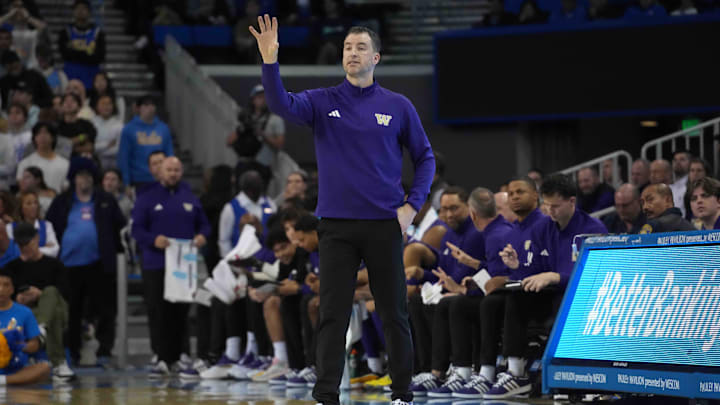 Dec 3, 2024; Los Angeles, California, USA; Washington Huskies head coach Danny Sprinkle gestures in the first half against the UCLA Bruins at Pauley Pavilion presented by Wescom. Mandatory Credit: Kirby Lee-Imagn Images