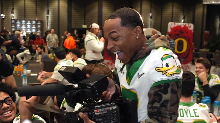 Dec 30, 2024; Los Angeles, CA, USA; Oregon Ducks wide receiver Evan Stewart (7) holds a video camera during Rose Bowl media day at Sheraton Grand LA. Mandatory Credit: Kirby Lee-Imagn Images Dec 30, 2024; Los Angeles, CA, USA; Oregon Ducks wide receiver Evan Stewart (7) holds a video camera during Rose Bowl media day at Sheraton Grand LA. Mandatory Credit: Kirby Lee-Imagn Images