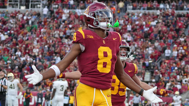 Nov 30, 2024; Los Angeles, California, USA; Southern California Trojans wide receiver Ja'Kobi Lane (8) celebrates after scori