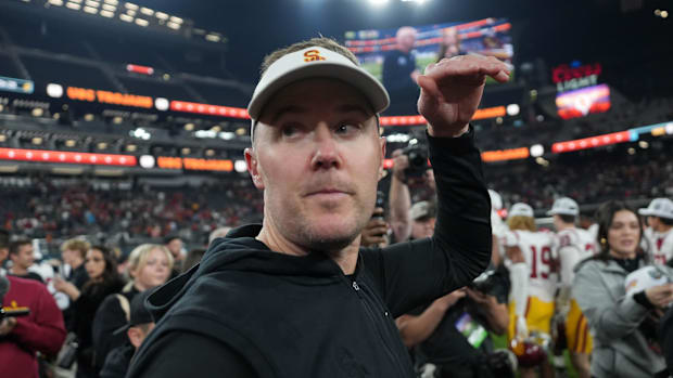 Dec 27, 2024; Las Vegas, NV, USA; Southern California Trojans head coach Lincoln Riley reacts after the game against the Texa