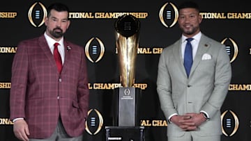 Jan 19, 2025; Atlanta, GA, USA; Ohio State Buckeyes head coach Ryan Day (left) and Notre Dame Fighting Irish head coach Marcus Freeman. Mandatory Credit: Kirby Lee-Imagn Images
