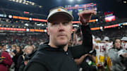Dec 27, 2024; Las Vegas, NV, USA; Southern California Trojans head coach Lincoln Riley reacts after the game against the Texas A&M Aggies at Allegiant Stadium. Mandatory Credit: Kirby Lee-Imagn Images