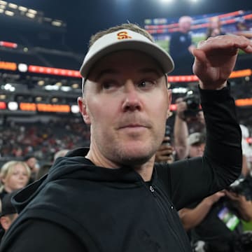 Dec 27, 2024; Las Vegas, NV, USA; Southern California Trojans head coach Lincoln Riley reacts after the game against the Texas A&M Aggies at Allegiant Stadium. Mandatory Credit: Kirby Lee-Imagn Images