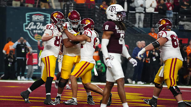 USC Trojans wide receiver Kyle Ford (81) celebrates with tight end Lake McRee (87) after scoring on a 7-yard TD