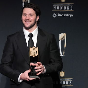 Buffalo Bills quarterback Josh Allen poses with the Most Valuable Player award during Super Bowl LIX NFL Honors