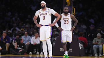 Dec 15, 2024; Los Angeles, California, USA; Los Angeles Lakers forward Anthony Davis (3) and forward LeBron James (23) react in the first half against the Memphis Grizzlies at Crypto.com Arena. Mandatory Credit: Kirby Lee-Imagn Images