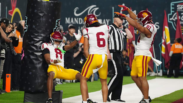 Dec 27, 2024; Las Vegas, NV, USA; Southern California Trojans wide receiver Ja'Kobi Lane (8) celebrates with wide receiver Ma