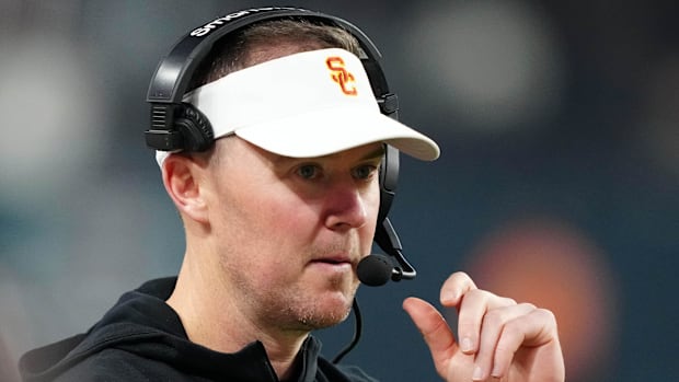 Dec 27, 2024; Las Vegas, NV, USA; Southern California Trojans head coach Lincoln Riley reacts against the Texas A&M Aggie