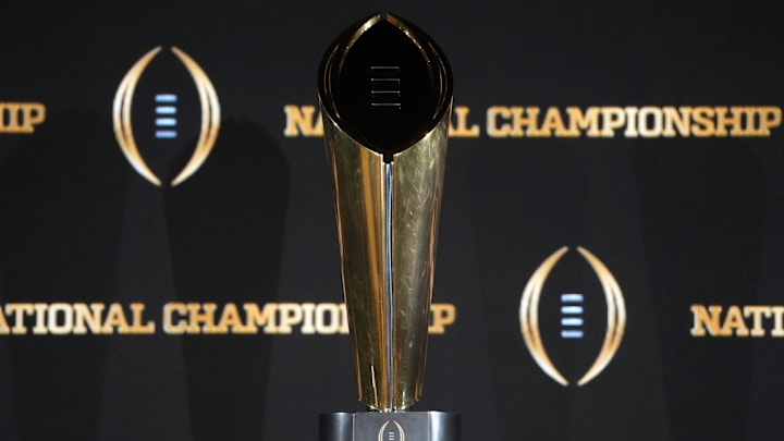 Jan 19, 2025; Atlanta, GA, USA; The College Football Playoff National Championship trophy at a press conference at The Westin Peachtree Plaza, Savannah Ballroom. Mandatory Credit: Kirby Lee-Imagn Images