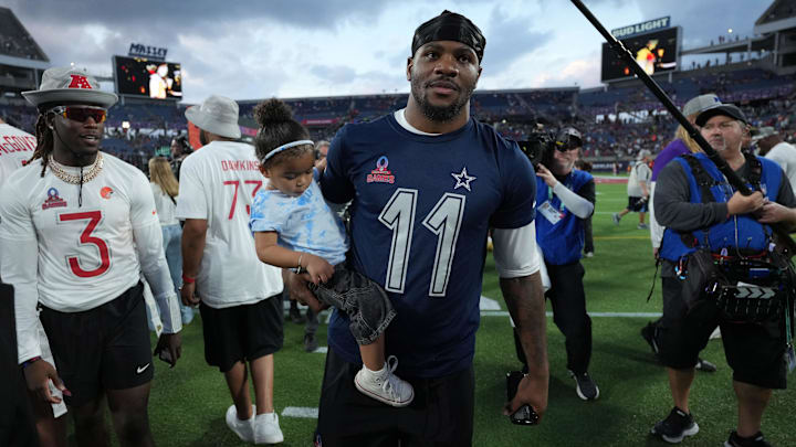 NFC defensive end Micah Parsons of the Dallas Cowboys holds his daughter Shatara Parsons after the 2025 Pro Bowl Games at Camping World Stadium. 