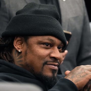 Marshawn Lynch was seen photographing the Seahawks vs. Raiders game on Thursday.