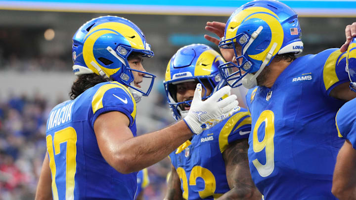Puka Nacua celebrates with Matthew Stafford and Kyren Williams after scoring a touchdown against the Bills. Puka Nacua celebrates with Matthew Stafford and Kyren Williams after scoring a touchdown against the Bills.