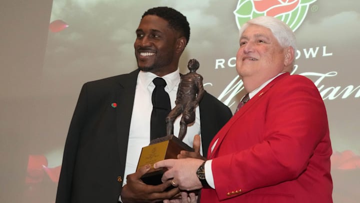 Dec 31, 2024; Pasadena, CA, USA; Southern California Trojans former running back Reggie Bush (left) poses with former Tournament of Roses president Alex Aghajanian during the Rose Bowl Hall fo Fame Induction Ceremony at University Club. Mandatory Credit: Kirby Lee-Imagn Images Dec 31, 2024; Pasadena, CA, USA; Southern California Trojans former running back Reggie Bush (left) poses with former Tournament of Roses president Alex Aghajanian during the Rose Bowl Hall fo Fame Induction Ceremony at University Club. Mandatory Credit: Kirby Lee-Imagn Images
