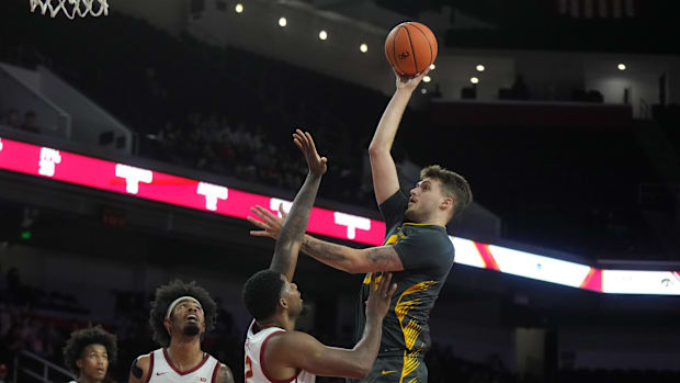 Jan 14, 2025; Los Angeles, California, USA; Iowa Hawkeyes forward Owen Freeman (32) shoots the ball against Southern Californ