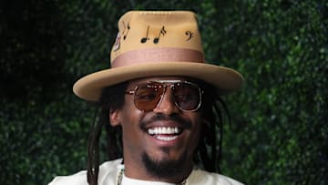 Feb 7, 2025; New Orleans, LA, USA; Cam Newton on Radio Row at the Super Bowl LIX media center. Mandatory Credit: Kirby Lee-Imagn Images