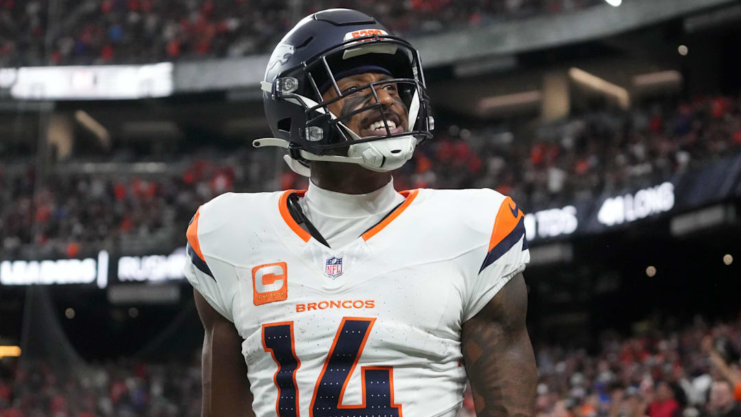 Nov 24, 2024; Paradise, Nevada, USA; Denver Broncos wide receiver Courtland Sutton (14) celebrates after scoring on a 18-yard touchdown pass against the Las Vegas Raiders at Allegiant Stadium. Mandatory Credit: Kirby Lee-Imagn Images