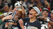 Oct 10, 2025; Phoenix, Arizona, USA; Las Vegas Aces center A'ja Wilson (22) celebrates with teammates after game four of the 2025 WNBA Finals at Mortgage Matchup Center. Mandatory Credit: Joe Camporeale-Imagn Images