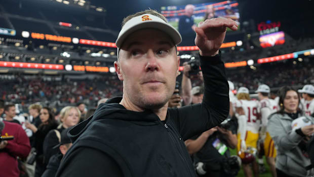 Dec 27, 2024; Las Vegas, NV, USA; Southern California Trojans head coach Lincoln Riley reacts after the game against the Texa
