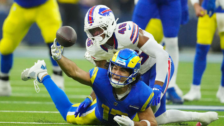 Dec 8, 2024; Inglewood, California, USA; Los Angeles Rams wide receiver Puka Nacua (17) attempts to catch the ball against Buffalo Bills cornerback Ja'Marcus Ingram (46) in the second half at SoFi Stadium. Mandatory Credit: Kirby Lee-Imagn Images