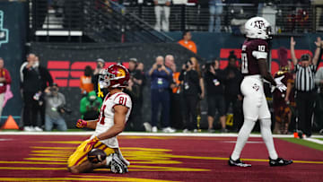 Dec 27, 2024; Las Vegas, NV, USA; iSouthern California Trojans wide receiver Kyle Ford (81) celebrates after scoring on a 7-yard touchdown reception against the Texas A&M Aggies at Allegiant Stadium. Mandatory Credit: Kirby Lee-Imagn Images