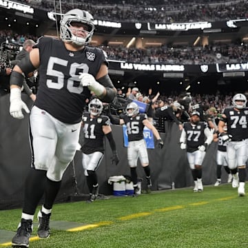 Dec 22, 2024; Paradise, Nevada, USA; Las Vegas Raiders guard Jackson Powers-Johnson (58) enters the field before the game against the Jacksonville Jaguars at Allegiant Stadium. Mandatory Credit: Kirby Lee-Imagn Images