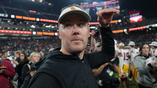 Dec 27, 2024; Las Vegas, NV, USA; Southern California Trojans head coach Lincoln Riley reacts after the game against the Texa