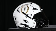 A College Football Playoff logo helmet at a press conference at The Westin Peachtree Plaza, Savannah Ballroom. Mandatory Credit: Kirby Lee-Imagn Images