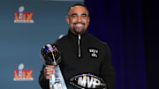 Feb 10, 2025; New Orleans, LA, USA; Philadelphia Eagles quarterback Jalen Hurts (1) poses with the Vince Lombardi trophy at the Super Bowl LIX Winning Head Coach and Most Valuable Player press conference at the Ernest N. Morial Convention Center. Mandatory Credit: Kirby Lee-Imagn Images