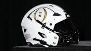 A College Football Playoff logo helmet at a press conference at The Westin Peachtree Plaza, Savannah Ballroom. Mandatory Credit: Kirby Lee-Imagn Images