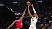 Jan 25, 2025; Inglewood, California, USA; Milwaukee Bucks forward Giannis Antetokounmpo (34) shoots the ball against LA Clippers guard James Harden (1) in the second half at Intuit Dome. Mandatory Credit: Kirby Lee-Imagn Images