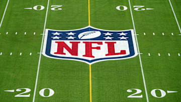 Feb 1, 2025; Orlando, FL, USA; An overall view of the NFL shield logo at midfield on the Camping World Stadium flag football field. Mandatory Credit: Kirby Lee-Imagn Images
