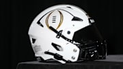 A College Football Playoff logo helmet at a press conference at The Westin Peachtree Plaza, Savannah Ballroom. Mandatory Credit: Kirby Lee-Imagn Images