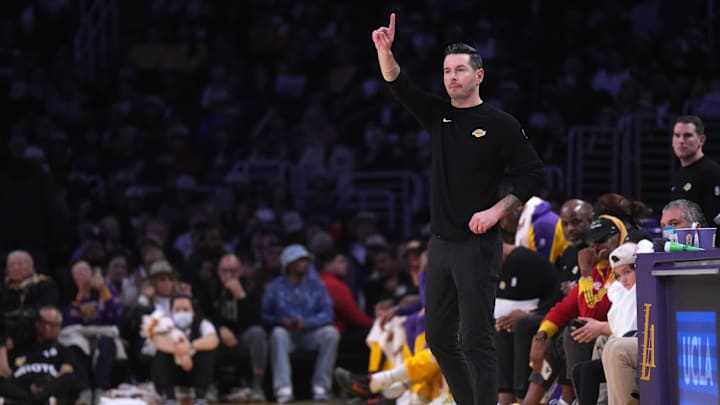 Dec 15, 2024; Los Angeles, California, USA; Los Angeles Lakers coach JJ Redick reacts in the second half against the Memphis Grizzlies at Crypto.com Arena. Mandatory Credit: Kirby Lee-Imagn Images
