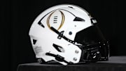 A College Football Playoff logo helmet at a press conference at The Westin Peachtree Plaza, Savannah Ballroom. Mandatory Credit: Kirby Lee-Imagn Images